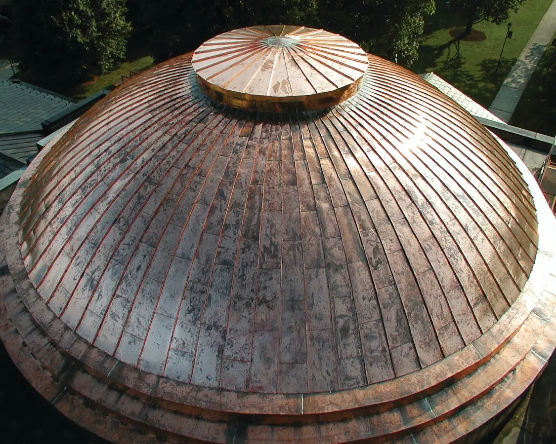 Craftsman Roofing crew installing a new roof in Chisolms